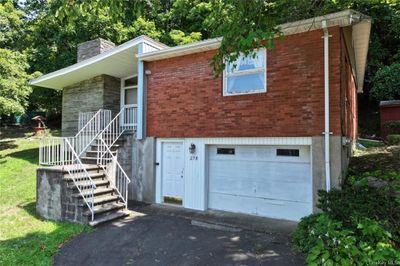 View of front of property featuring a garage | Image 3