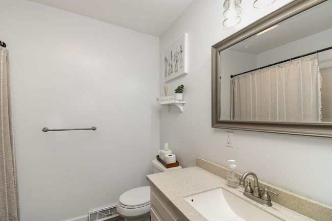 Main floor full bath, there are 3 bathrooms on this level alone! | Image 19