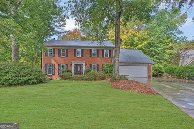 4224 Holly Bank Court, House other with 4 bedrooms, 2 bathrooms and 2 parking in Peachtree Corners GA | Image 1