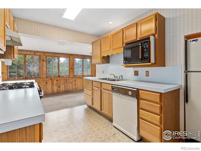 The owner has installed new kitchen appliances that are stainless steel. | Image 14