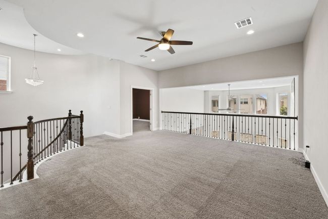 Spare room featuring visible vents, a ceiling fan, carpet, and recessed lighting | Image 26