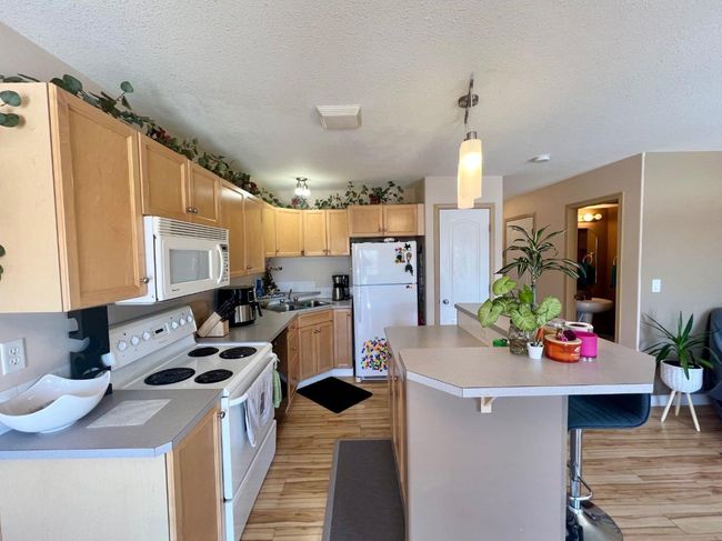 60 Adamson Ave, Home with 2 bedrooms, 3 bathrooms and 2 parking in Red Deer AB | Image 4
