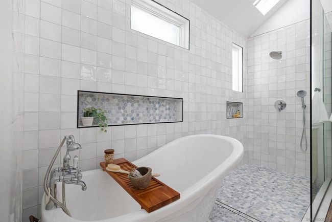 Primary bathroom with huge shower and claw tub combo with 70inch double vanity and LED mirror | Image 30
