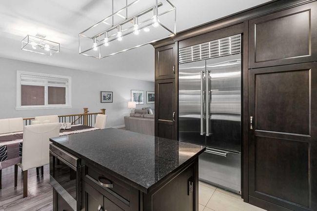 323 Alcott Cres Se, House other with 5 bedrooms, 3 bathrooms and 2 parking in Calgary AB | Image 4