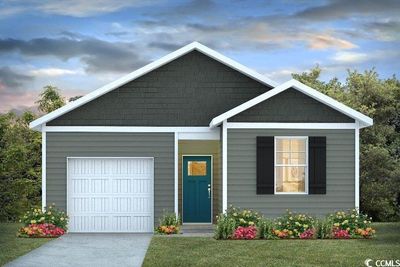 View of front of house featuring a garage and a lawn | Image 1