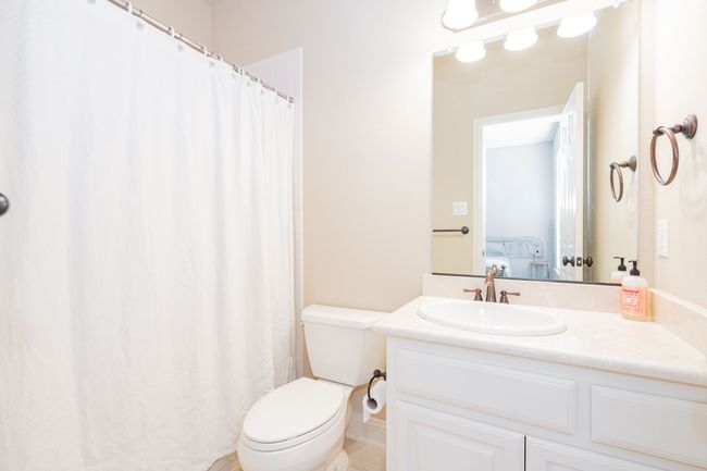 Ensuite bathroom with ensuite bathroom, vanity, and toilet | Image 23