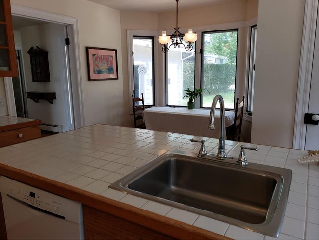 Kitchen featuring Island and nook | Image 20