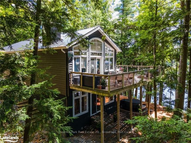 Nestled in the trees | Image 36