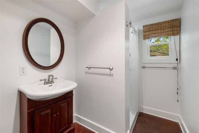 Bathroom featuring vanity and baseboards | Image 27