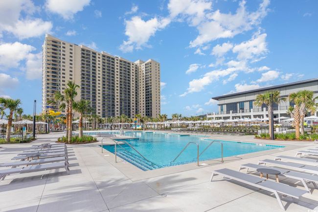 Community pool featuring a patio | Image 31