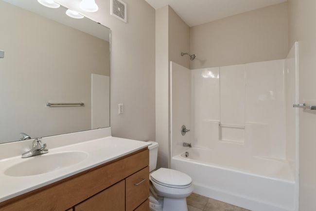 Three very large and nicely cared for bathrooms. (The photos are of unit 401. Owned by the same person and finishes that are VERY similar) | Image 13