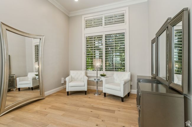 Living area featuring crown molding and light wood finished floors | Image 30
