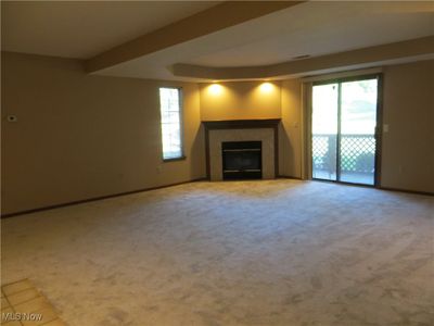 Unfurnished living room new carpet | Image 2