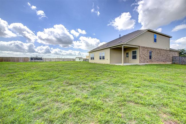 View of yard with a patio | Image 29