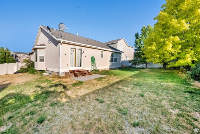Back of house featuring stucco siding | Image 20