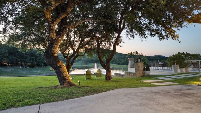 View of home's community featuring a yard | Image 16