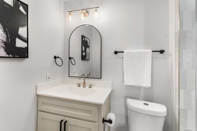 Bathroom with vanity, toilet and walk in shower | Image 12