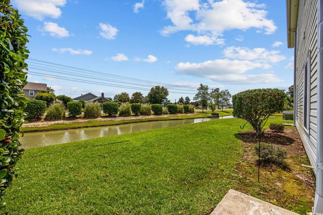 View of green lawn featuring a water view | Image 25