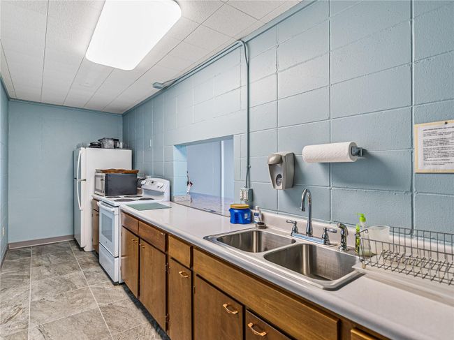 KITCHEN ADJACENT TOGATHERING/MULTIPURPOSE ROOM | Image 35