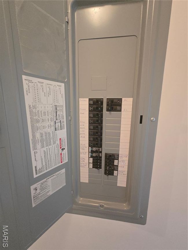 Utility room featuring electric panel | Image 21