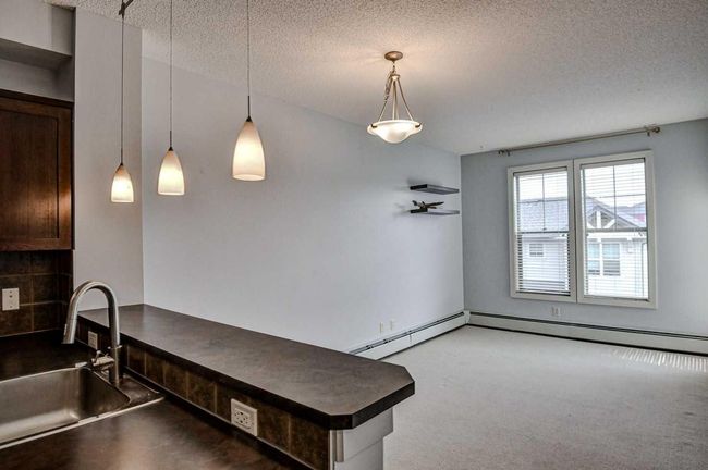 412 - 201 Sunset Dr, Condo with 1 bedrooms, 1 bathrooms and 2 parking in Cochrane AB | Image 6