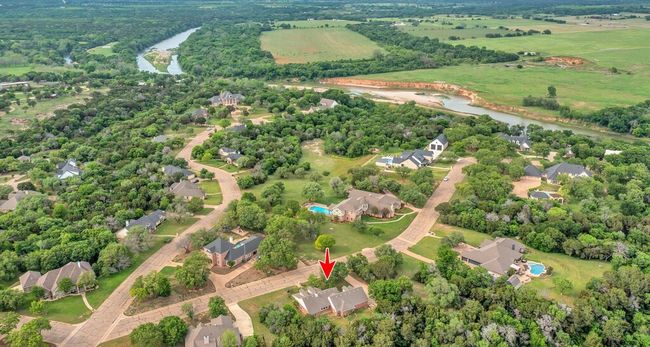 Aerial view featuring view of Brazos River in proximity to home | Image 34