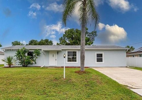 711 Nw Riverside Dr, Port St. Lucie, FL, 34983-1581 | Card Image