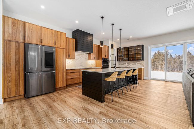 7433 Dwyer Hill Rd, House other with 3 bedrooms, 3 bathrooms and 18 parking in Burritts Rapids ON | Image 6