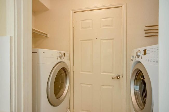 Laundry room featuring washer / dryer | Image 9