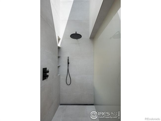 Walk in shower flows with natural light | Image 23