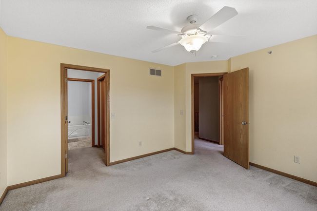 Primary bedroom with walk-through bathroom. | Image 17