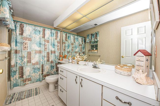 10 Lyons Ln, House other with 4 bedrooms, 3 bathrooms and null parking in Coram NY | Image 22