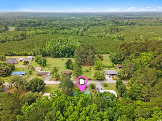 Aerial overview of property's location featuring a forest | Image 8