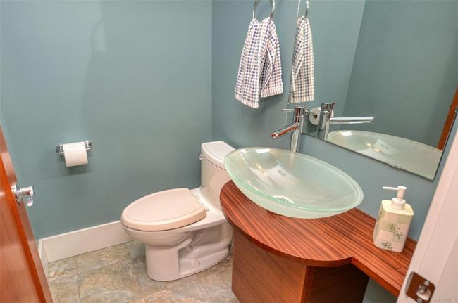 Two piece half bath with toilet and vanity | Image 10