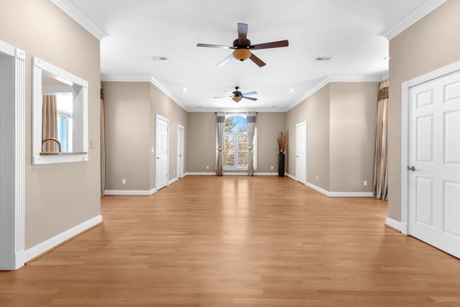 bonus room with 3 walk in closets | Image 31
