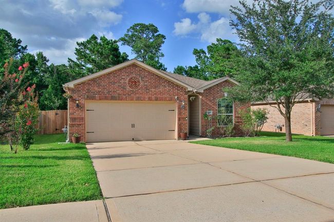 7551 Fettle Ln, House other with 3 bedrooms, 2 bathrooms and 2 parking in Conroe TX | Image 6