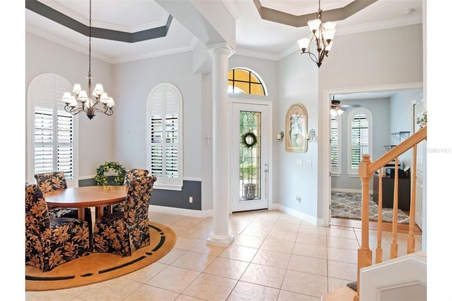 Lovely Foyer with 12' to 14' tray ceiling. | Image 4