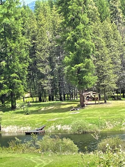 View of property from across the river | Image 2