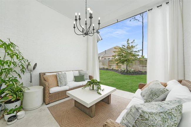 Experience serene outdoor living in this beautifully designed patio space, perfect for relaxation and entertaining. | Image 35