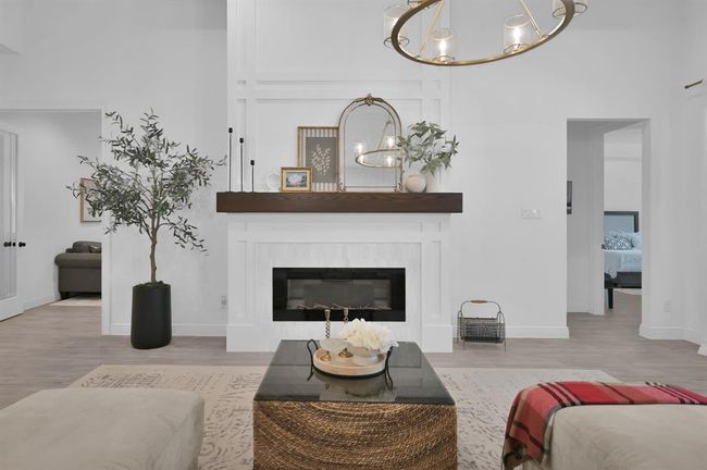 Stunning Fireplace that was custom built for the space | Image 15