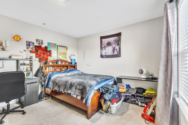 bedroom with carpet flooring | Image 29