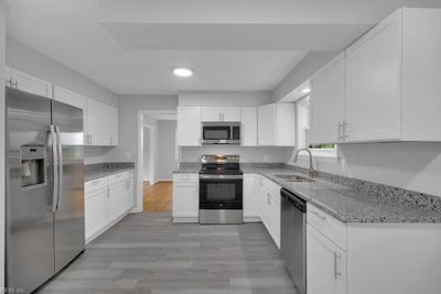 Updated Kitchen with New Cabinets, Granite Countertops, & Stainless Steel Appliances | Image 3