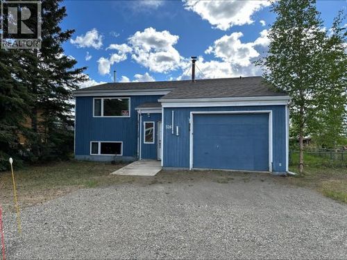 526 Douglass Dr, House with 3 bedrooms, 2 bathrooms and null parking in Faro YT | Card Image