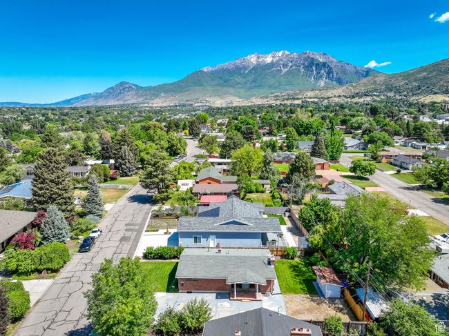 Aerial perspective of suburban area with a mountain backdrop | Image 25