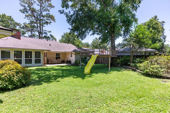 Huge shaded backyard playground | Image 5