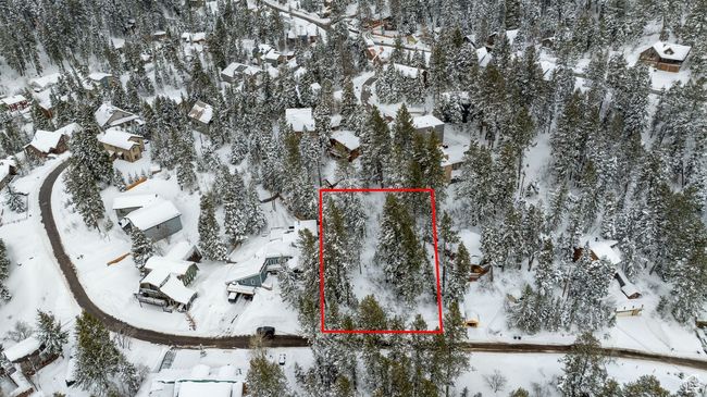Snowy aerial view featuring a residential view | Image 9
