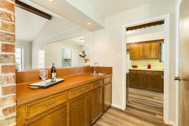 Wet bar between the kitchen & dining room perfect to set up your buffet full of your favorite savories. | Image 18