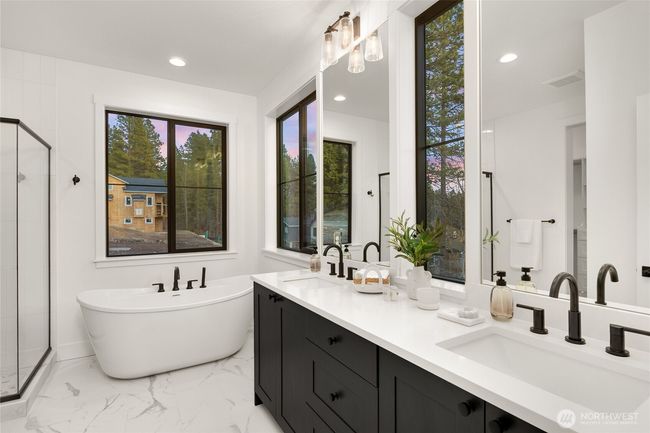 As the newest PNW master-planned community, enjoy 200+ acres of open space, trails & the Coal Trax Mt Bike Park. Soaring ceilings in the great roommake each day worthy of celebration & open floorplan appeals to entertaining. Covered deck & patio. Southern-facing homesites range from the mid600s- 900ks. Enjoy a variety of innovative & distinctive new home options with the best all-season recreation just moments away! Built for the future, indulge in a retreat just 90-min to Seattle. Plans and elevations are artist’s renderings only, may not accurately represent the actual condition of a home asconstructed and may also contain options and upgrades which are not included in the sale. Trailside Homes reserves the right to make changes to the floorplan, specifications, dimensions, design and elevations without prior notice. Stated dimensions and square footage are estimated and should not be usedas representations of the home’s actual size. | Image 19