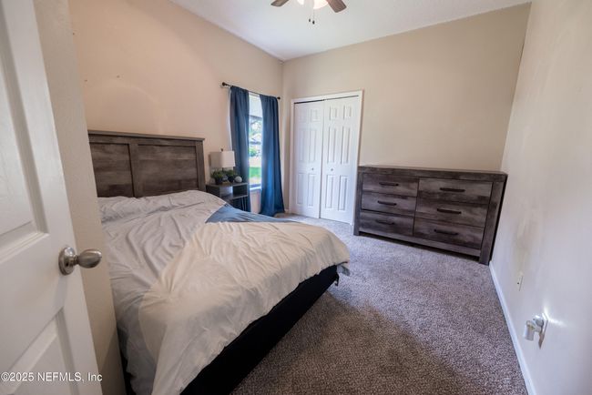 11760 Huckleberry Trl E, House other with 4 bedrooms, 2 bathrooms and null parking in MACCLENNY FL | Image 31