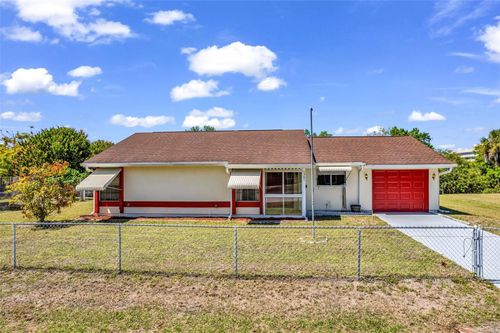 1361 Frizzell Ln Nw, PORT CHARLOTTE, FL, 33948-2033 | Card Image